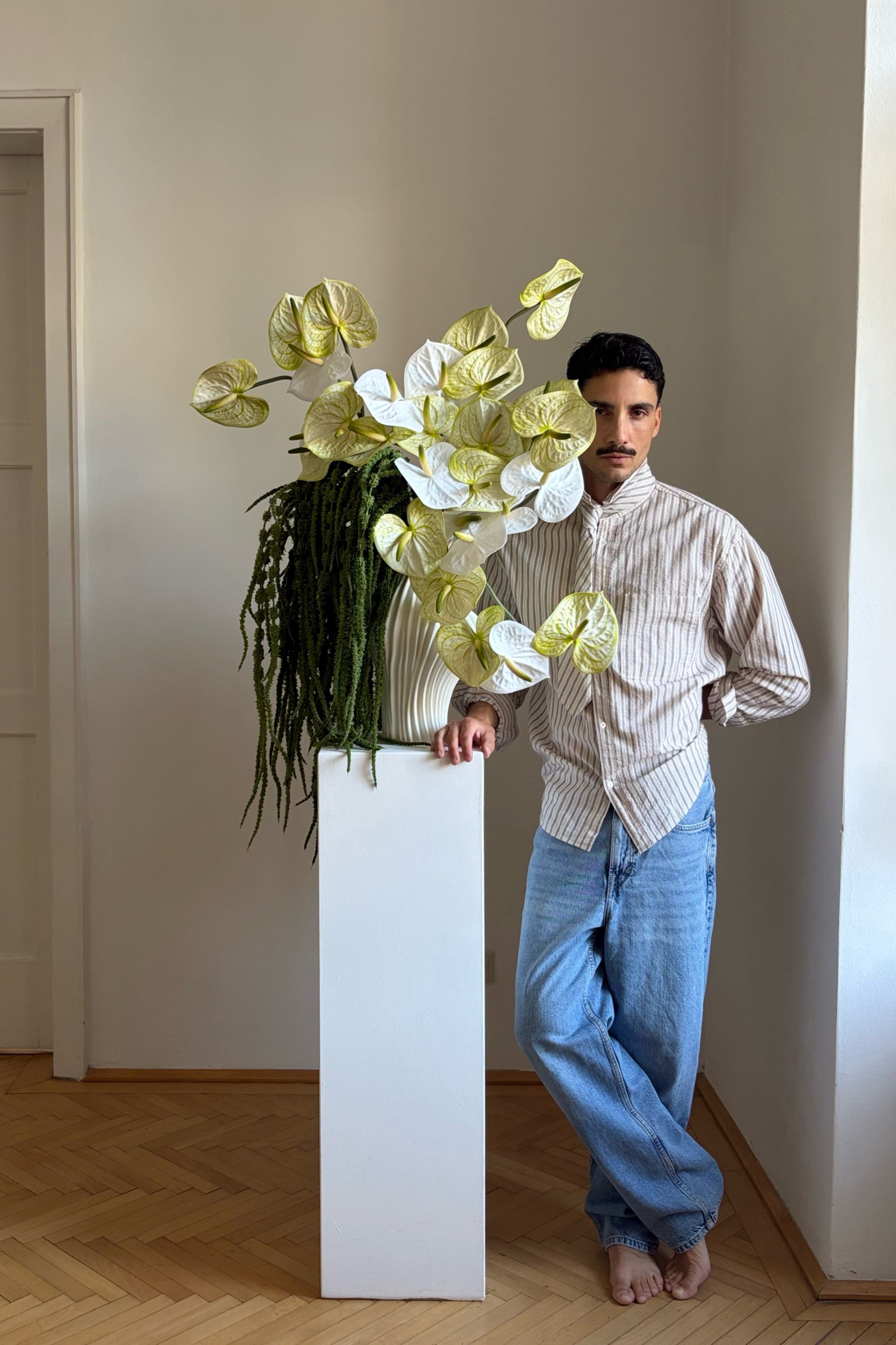 CURATED BY MARTIN EHMELÉ